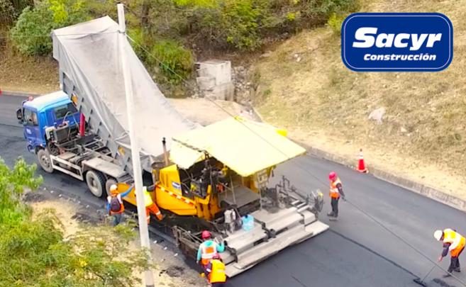 new-road-pavement-process-under-heavy-rain-conditions